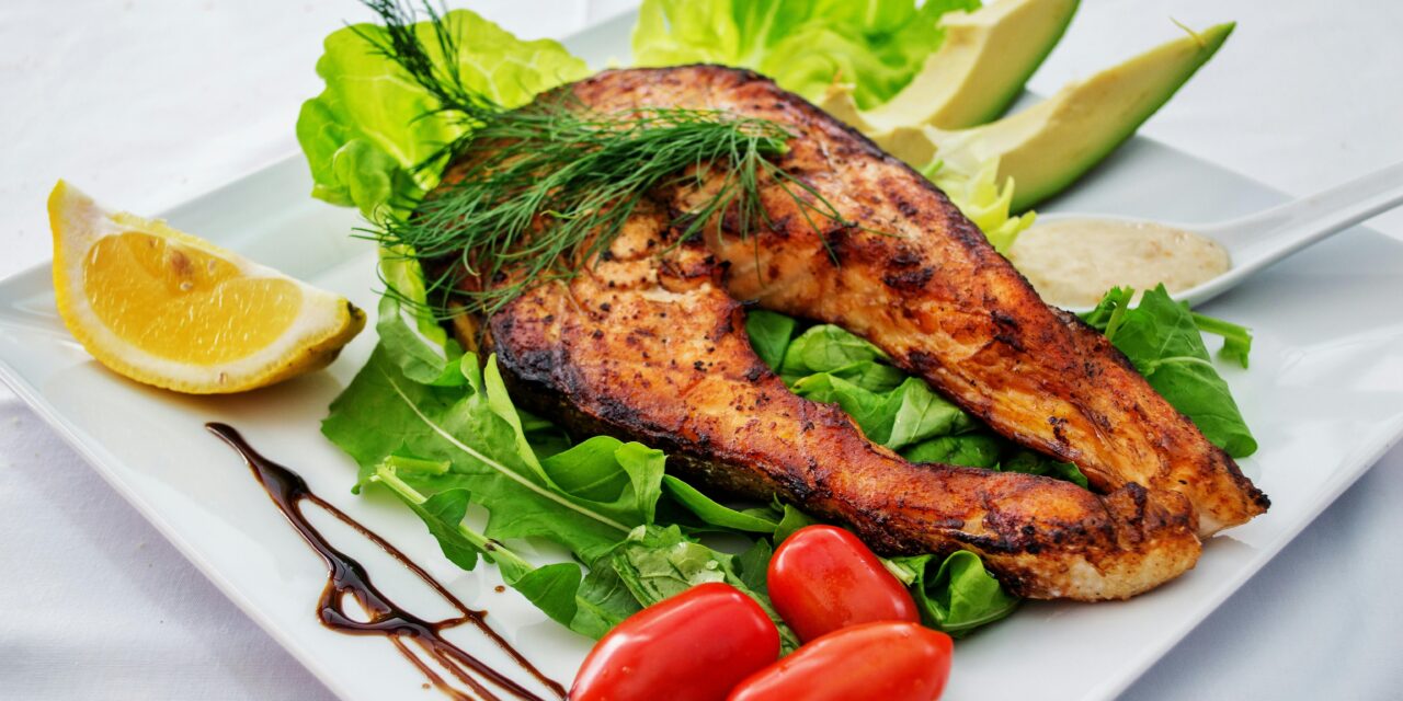 How much protein do older females need each day to optimize muscle mass?