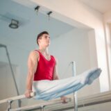 Why do gymnastics injuries occur?